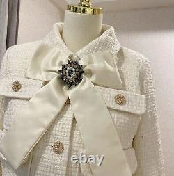 Cream tailored tweed chic gold button skirt blazer jacket suit set outfit lapel